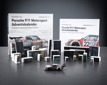 Load image into Gallery viewer, FRANZIS Porsche 911 Motorsport Advent Calendar - Carrera RSR Turbo 2.1 1:43 Model Kit with Engine Sound Base, A2 Poster & 52-Page Book