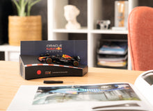 Load image into Gallery viewer, FRANZIS Oracle Red Bull Racing Advent Calendar — RB21 1:43 Metal Model Kit with Engine Sound Base &amp; 52-Page Book
