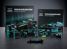 Load image into Gallery viewer, FRANZIS Aston Martin Aramco F1 Advent Calendar — AMR25 1:43 Model Kit with Engine Sound Base, A2 Poster &amp; 52-Page Book
